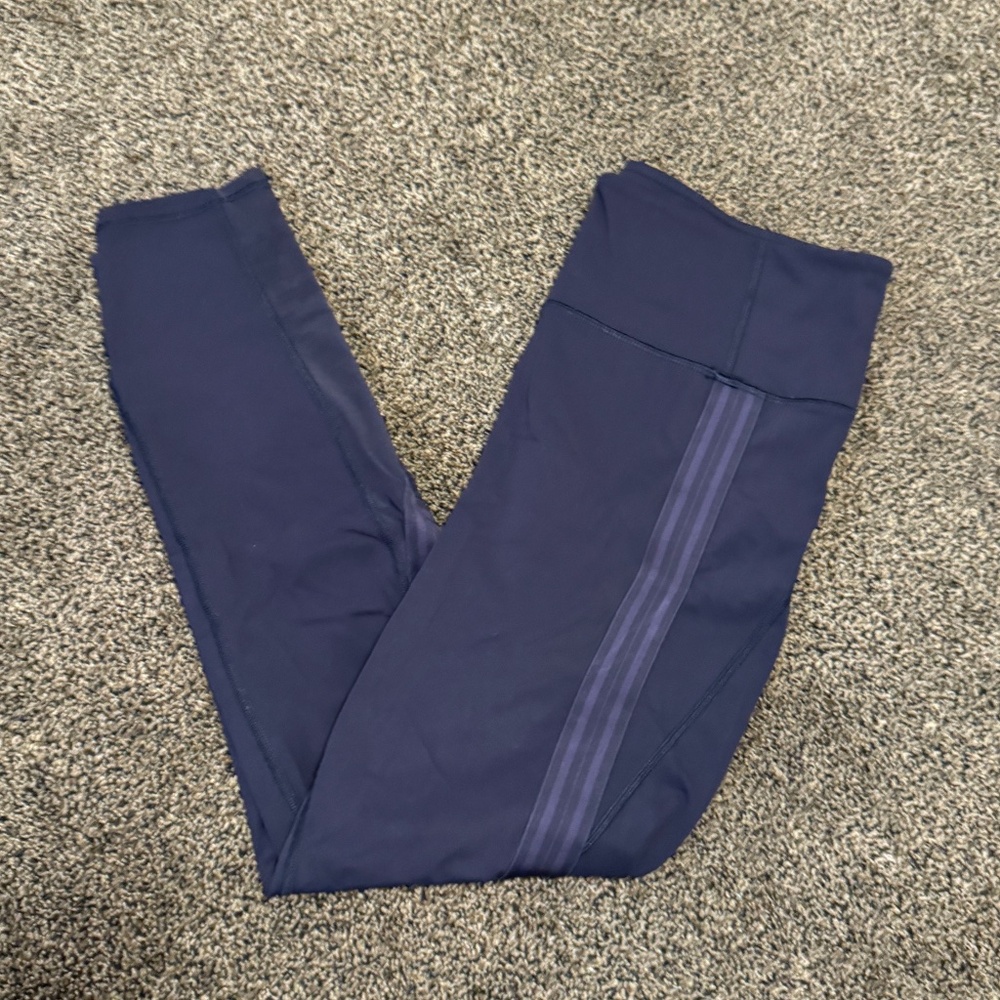 Dark purple leggings with stripe